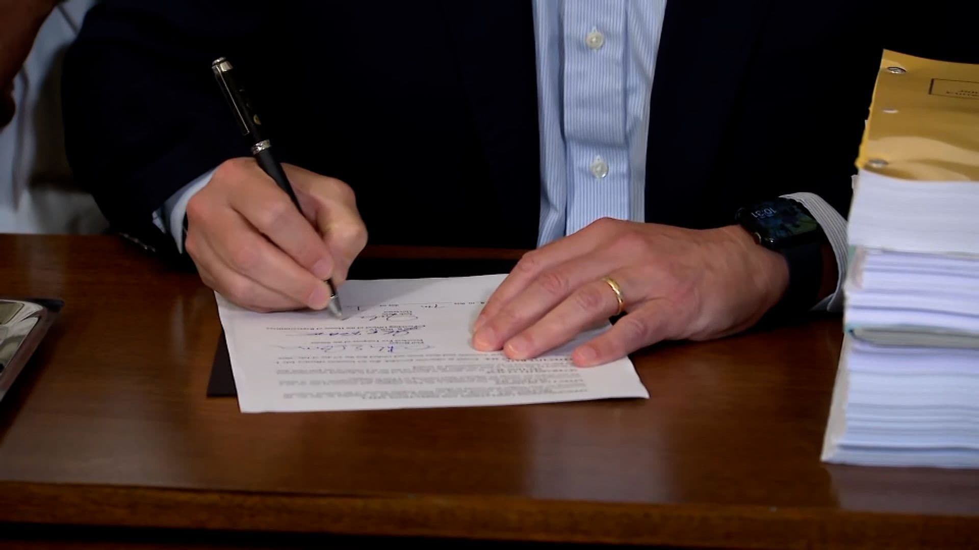 Stein signs GOP-proposed NC budget, ushering in lower taxes and raises for state employees